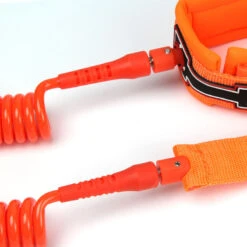 LEASH DE SUP HOWZIT COIL ORANGE -Paddle Wave Soldes leash de sup howzit coil orange 3
